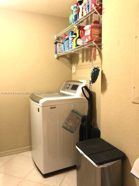 6584 West Sample Road, Unit 6584 Coral Springs, FL 33067 - Photo 11 of 13 a utility room with dryer and washer