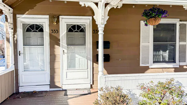 a front view of a house with a shower