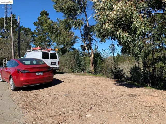 a view of a backyard of the house