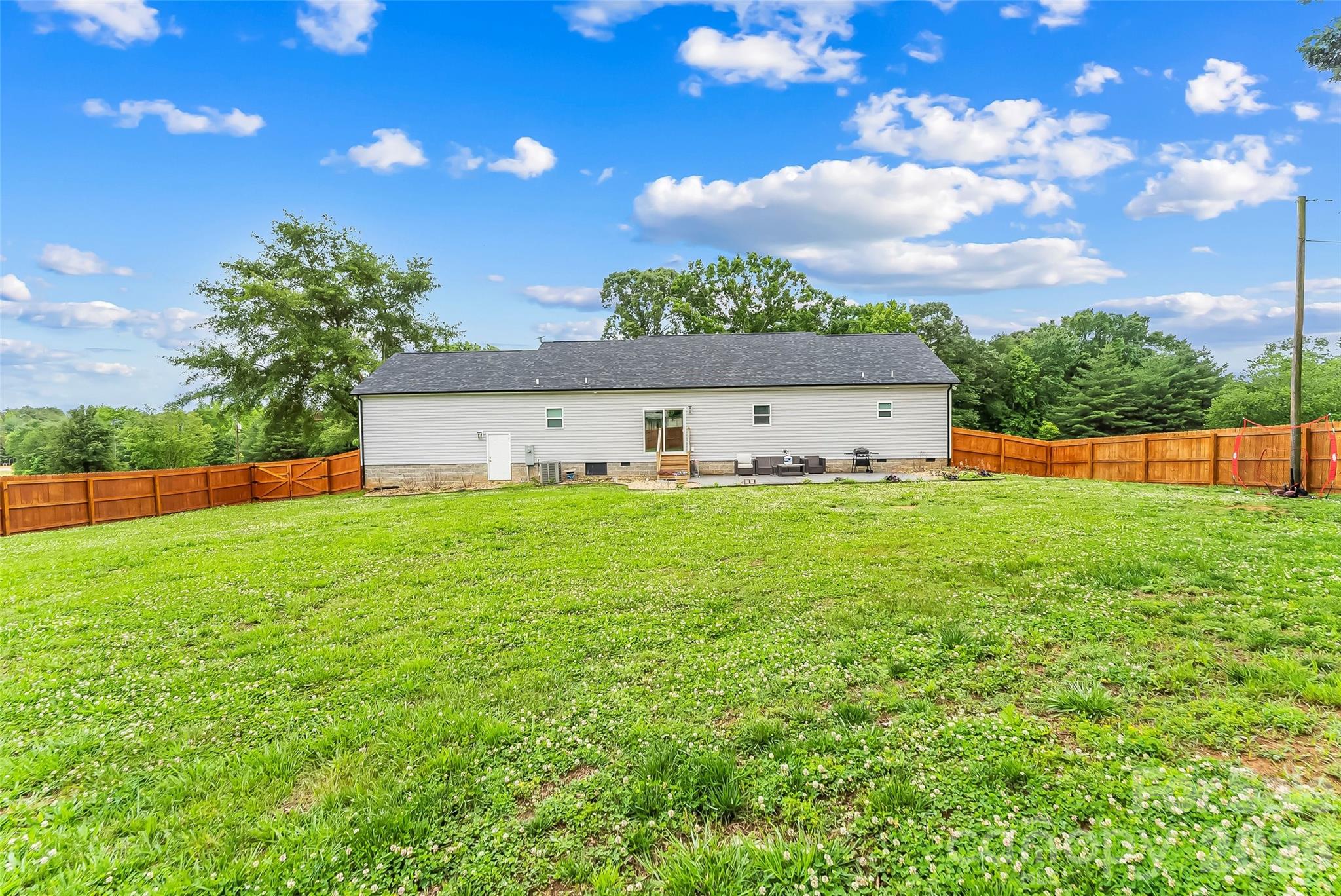 3511 Randleman Road Iron Station, NC 28080 - Photo 26 of 31 a front view of a house with garden