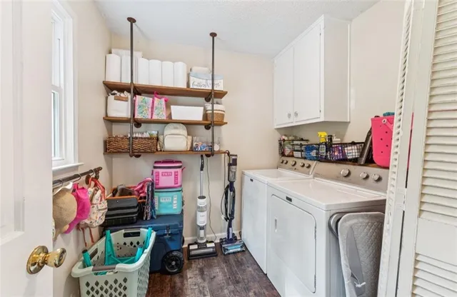 a utility room with dryer and washer