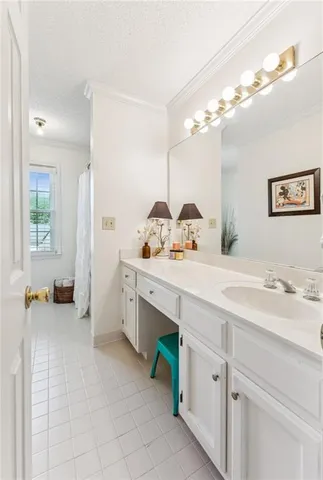 a spacious bathroom with a sink double vanity