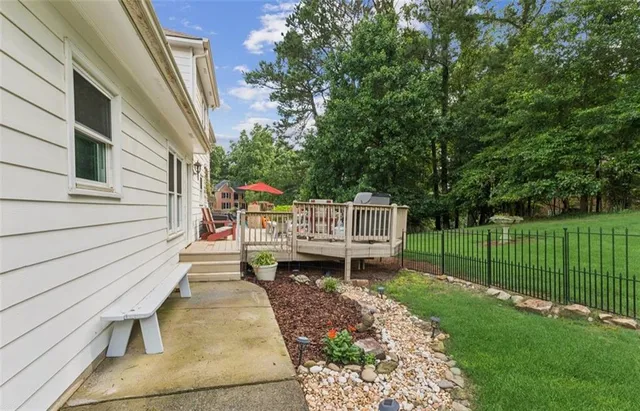 a view of a chair and table of the house