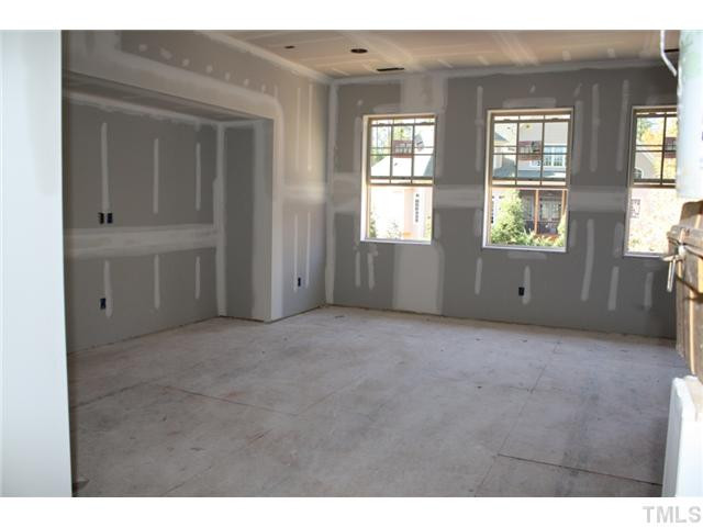 9211 Concord Hill Court Raleigh, NC 27613 - Photo 11 of 18 Large step up bonus room with builtins perfect for gaming station. Bonus Room