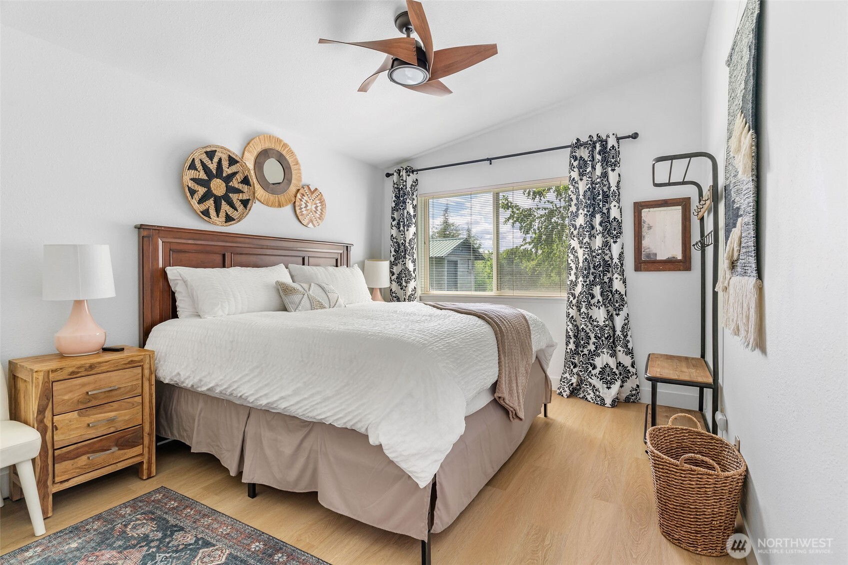 32 Midland Road Brewster, WA 98812 - Photo 14 of 40 a bedroom with a bed and a window