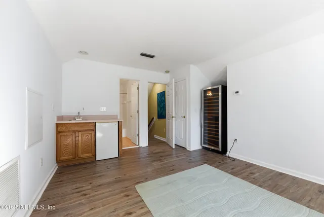 a view of a patio with couches table and chairs