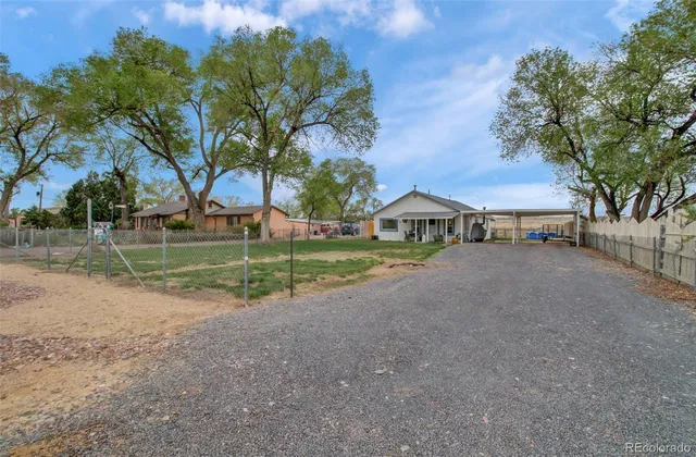 a view of house with outdoor space