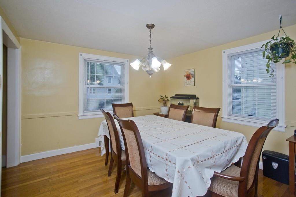 46 Thames Street Springfield, MA 01104 - Photo 4 of 12 a view of a dining room with furniture window and wooden floor