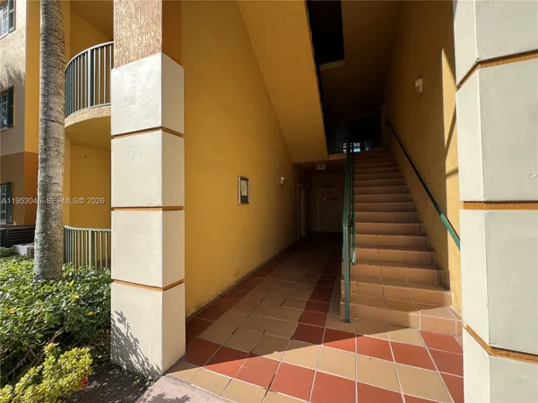 a view of entryway with a front door