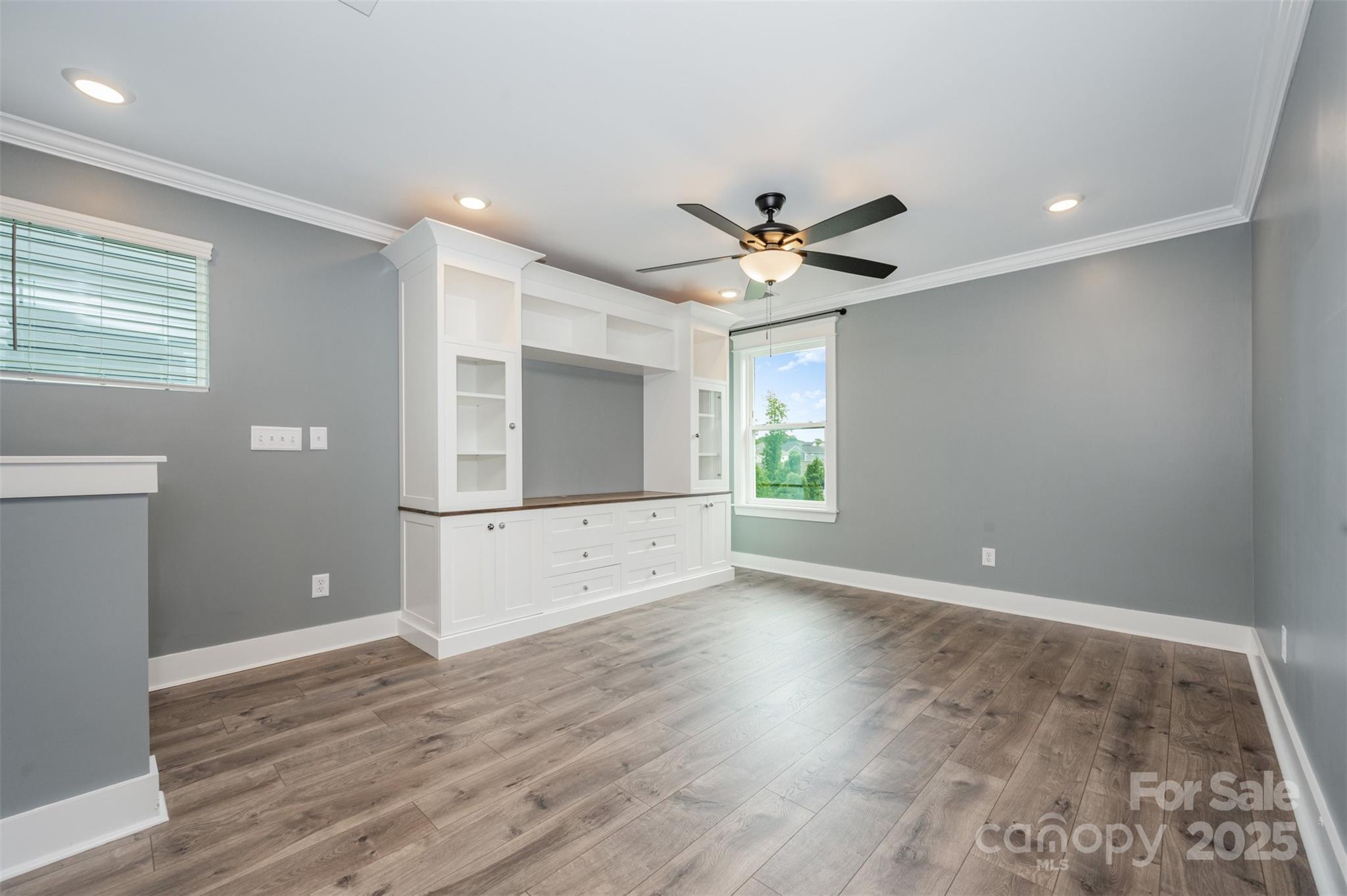 651-r L R L Stowe Road Belmont, NC 28012 - Photo 20 of 35 a view of an empty room with window and wooden floor