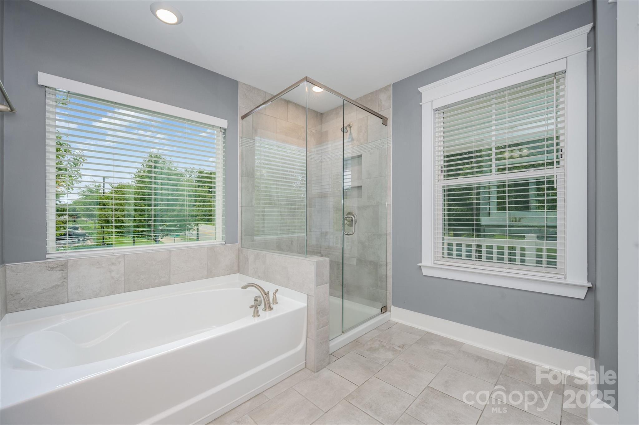 651-r L R L Stowe Road Belmont, NC 28012 - Photo 24 of 35 a spacious bathroom with a bathtub and shower