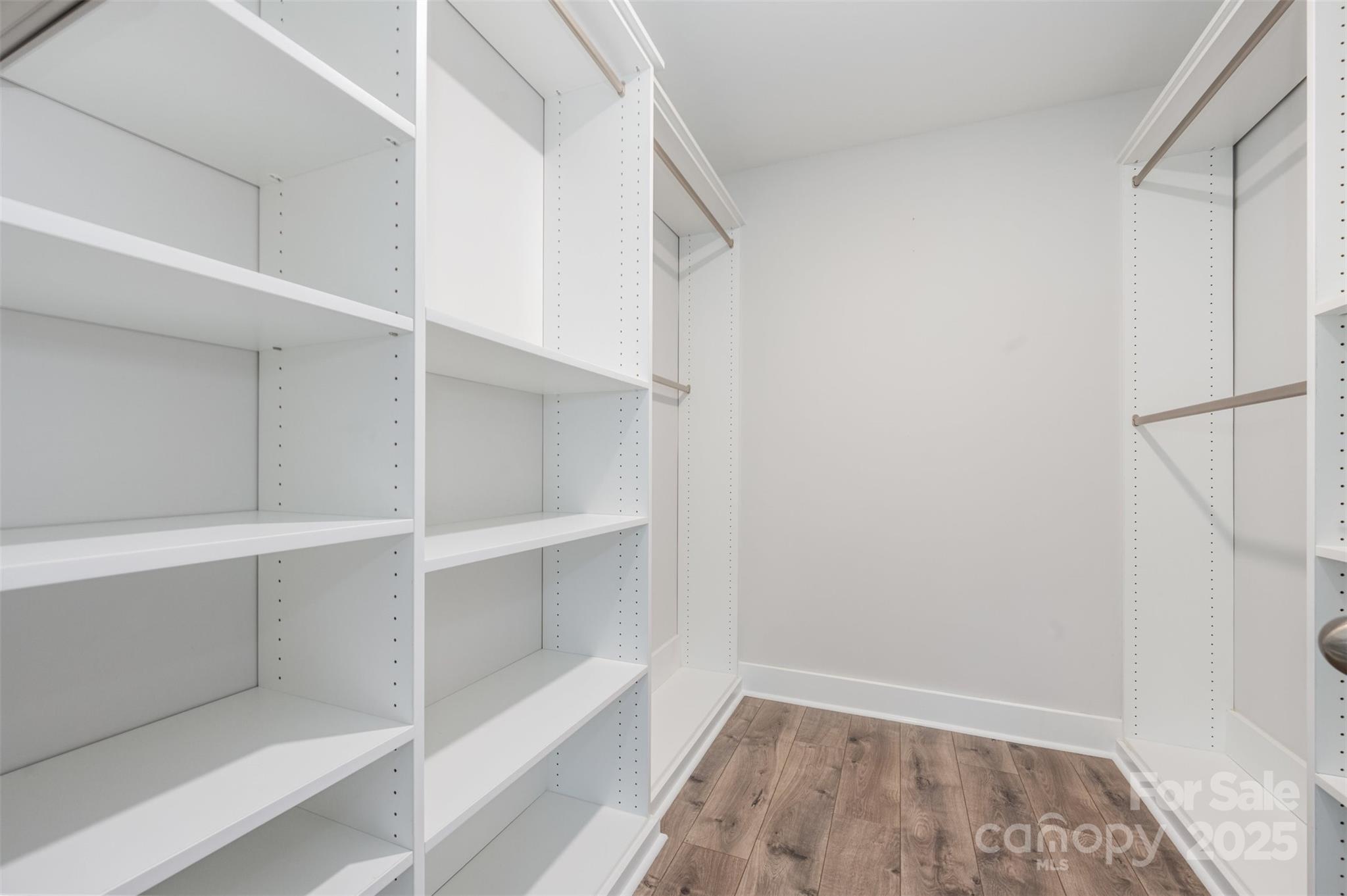651-r L R L Stowe Road Belmont, NC 28012 - Photo 27 of 35 a view of walk in closet with empty racks