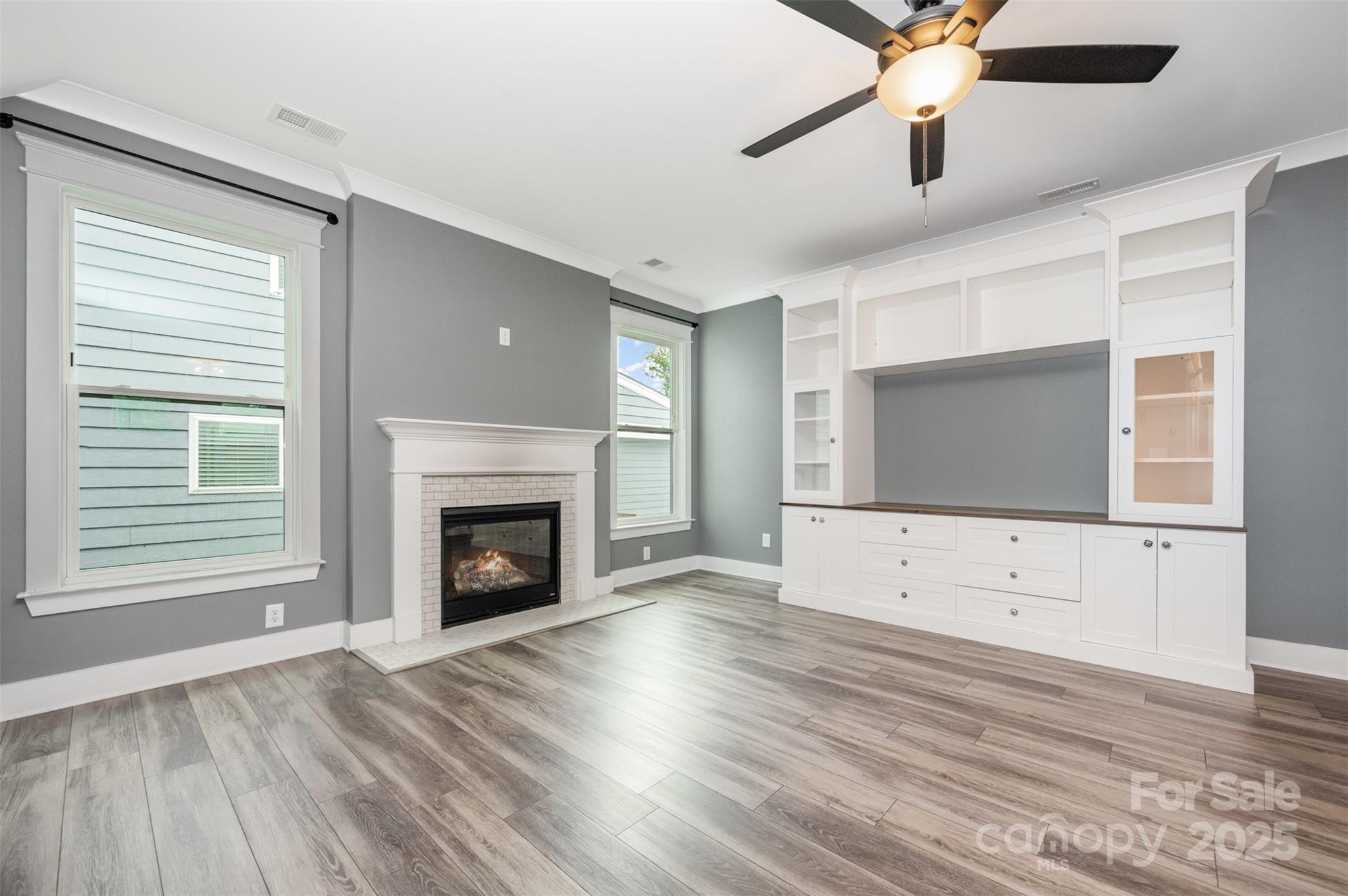 651-r L R L Stowe Road Belmont, NC 28012 - Photo 6 of 35 a living room with flat screen tv and a fireplace