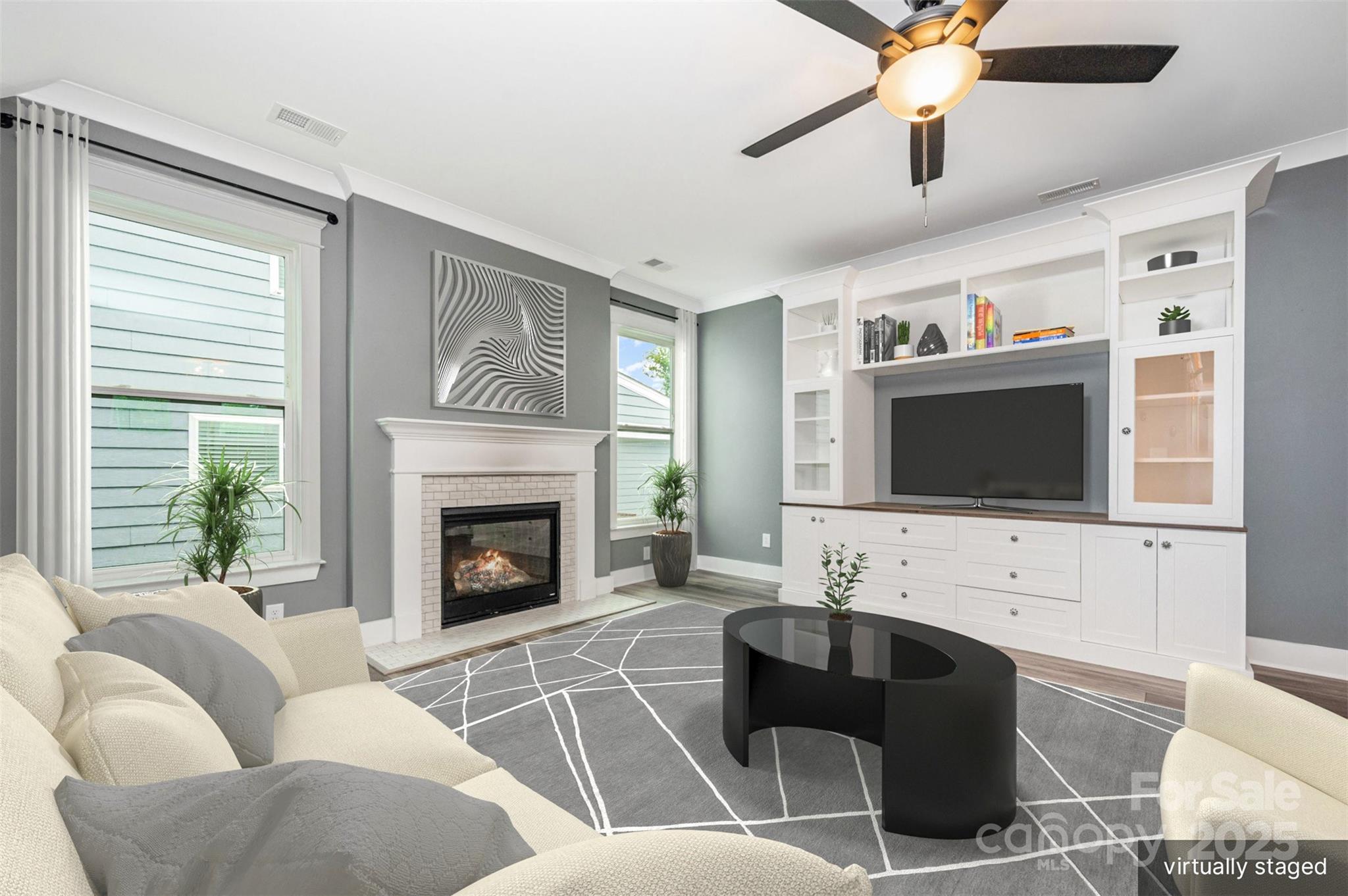 651-r L R L Stowe Road Belmont, NC 28012 - Photo 7 of 35 a living room with furniture a fireplace and a flat screen tv