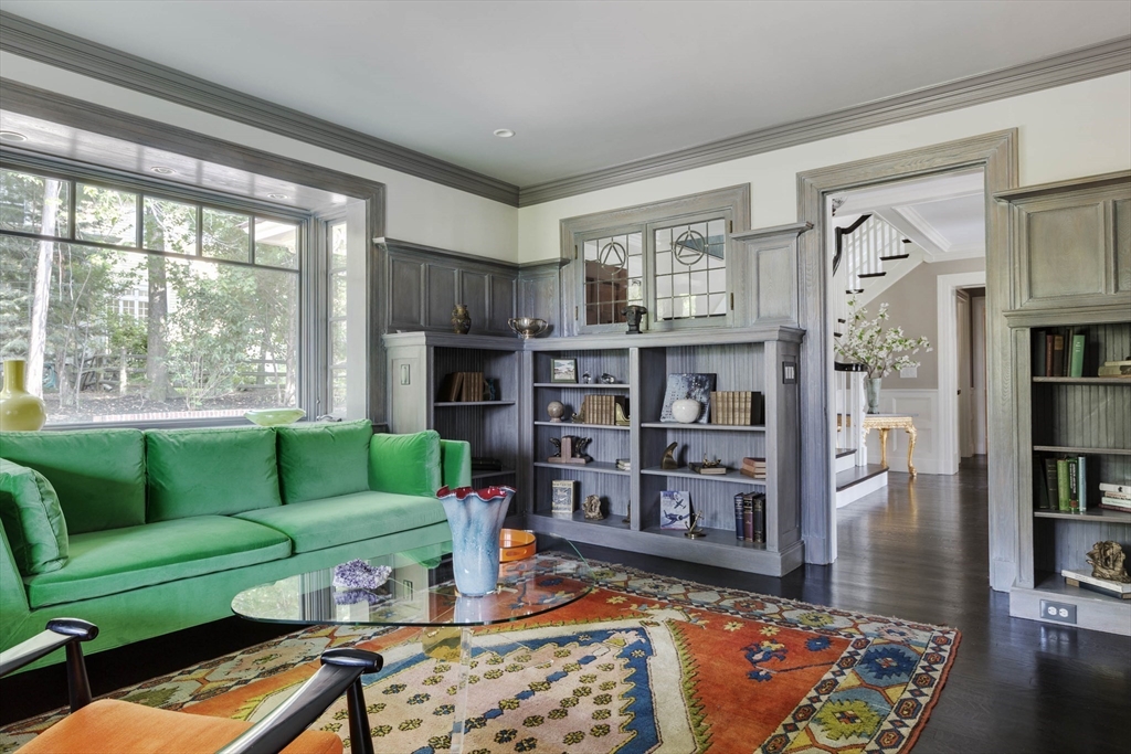1 Adams Street Lexington, MA 02420 - Photo 11 of 20 a living room with furniture and a book shelf