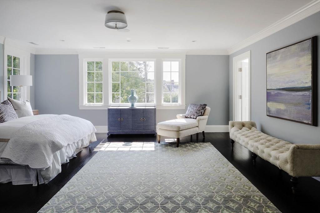 1 Adams Street Lexington, MA 02420 - Photo 12 of 20 a spacious bedroom with a bed and a window