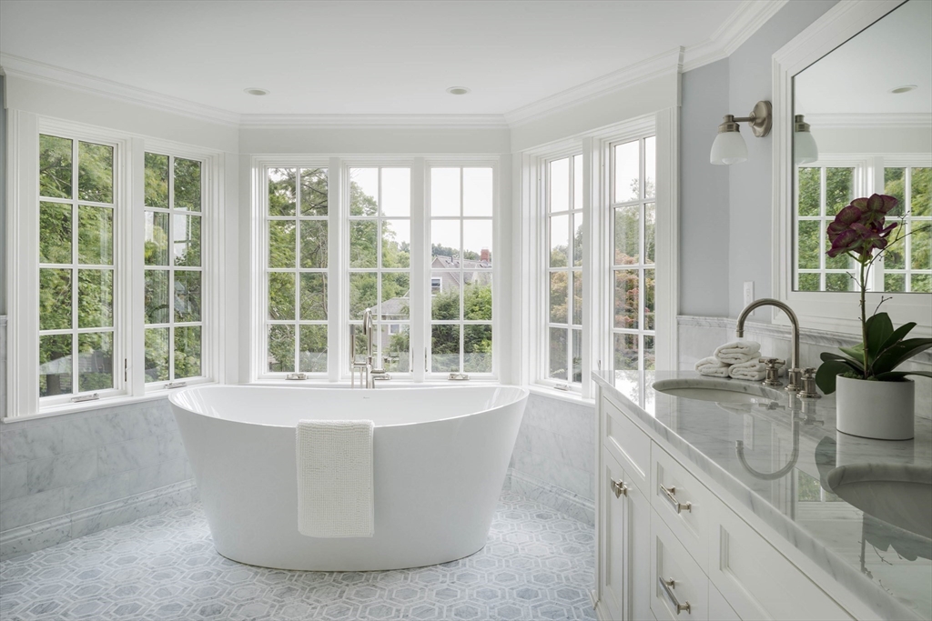 1 Adams Street Lexington, MA 02420 - Photo 14 of 20 a large window with kitchen countertops and a sink