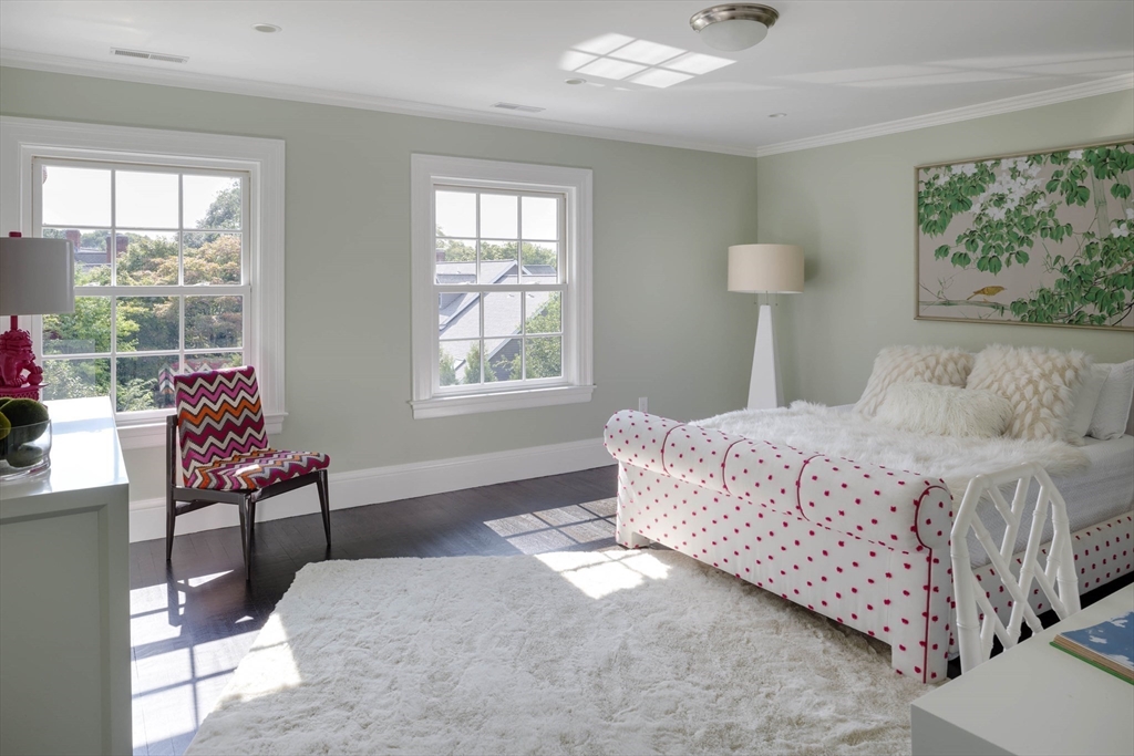 1 Adams Street Lexington, MA 02420 - Photo 16 of 20 a bedroom with a bed and a window
