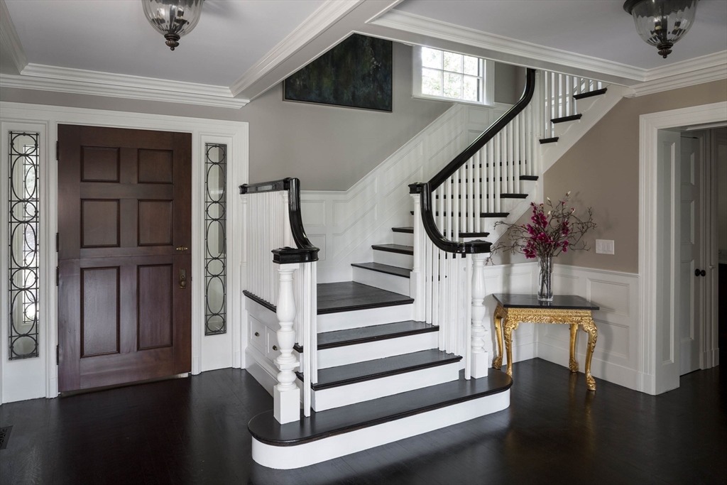 1 Adams Street Lexington, MA 02420 - Photo 3 of 20 a view of entryway and hall with wooden floor