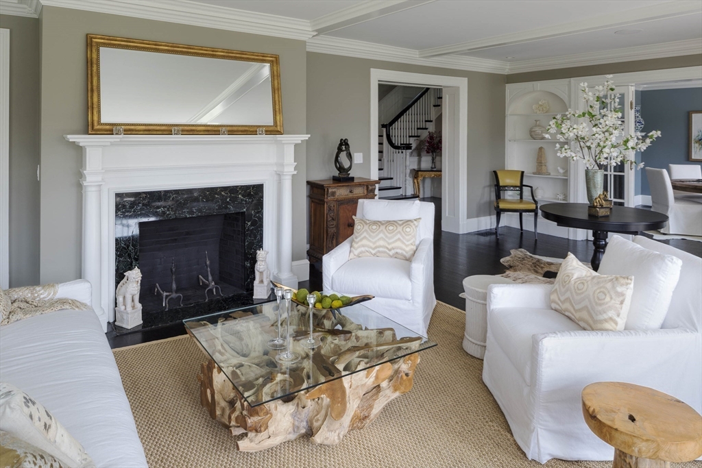 1 Adams Street Lexington, MA 02420 - Photo 9 of 20 a living room with furniture and a fireplace