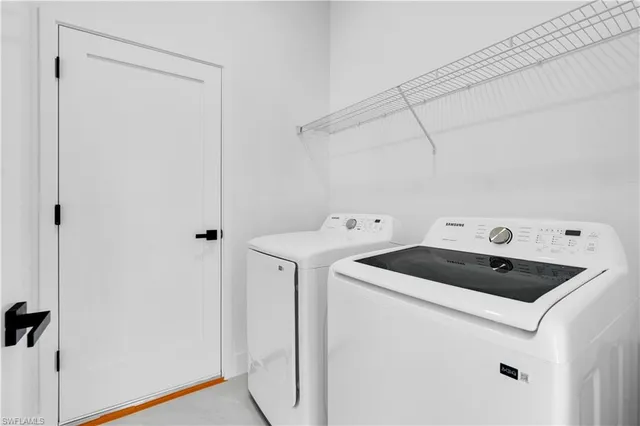 a room with white wall and white cabinet