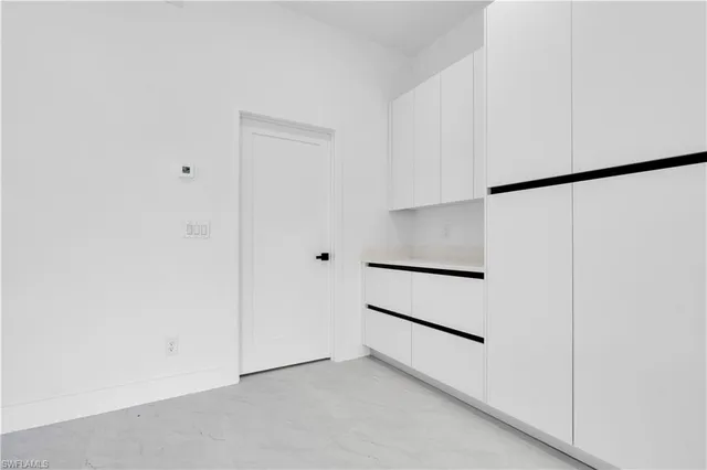 an empty room with closet