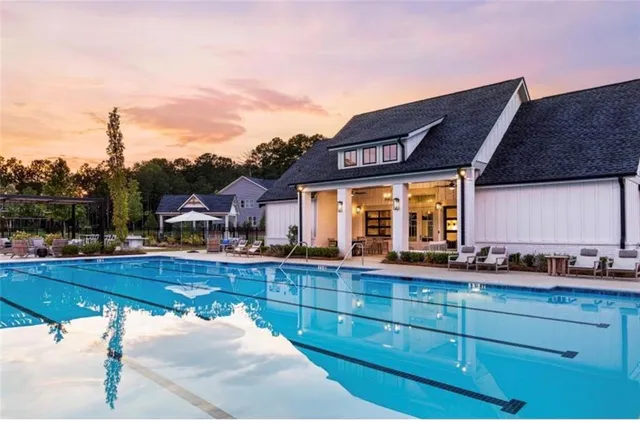 a view of a porch with furniture and a porch