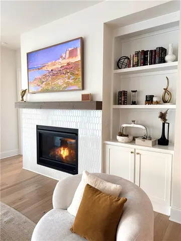 a kitchen with kitchen island granite countertop a sink counter top space and stainless steel appliances