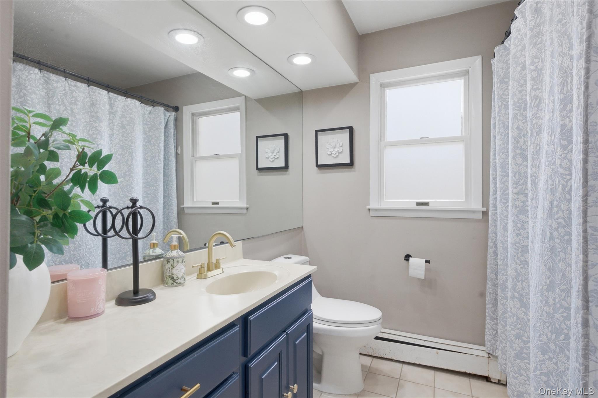 2 Olympus Road Highland Mills, NY 10930 - Photo 23 of 31 a bathroom with a granite countertop sink and a mirror