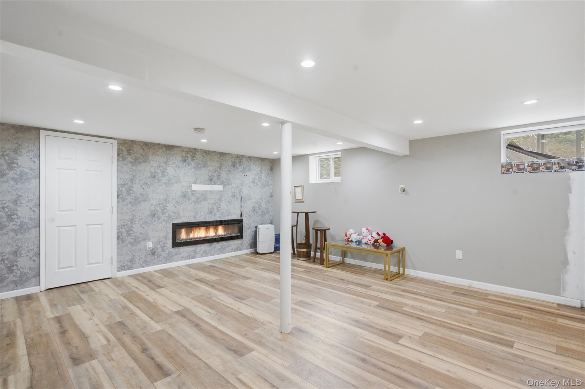 2 Olympus Road Highland Mills, NY 10930 - Photo 25 of 31 a living room with furniture and a wooden floor