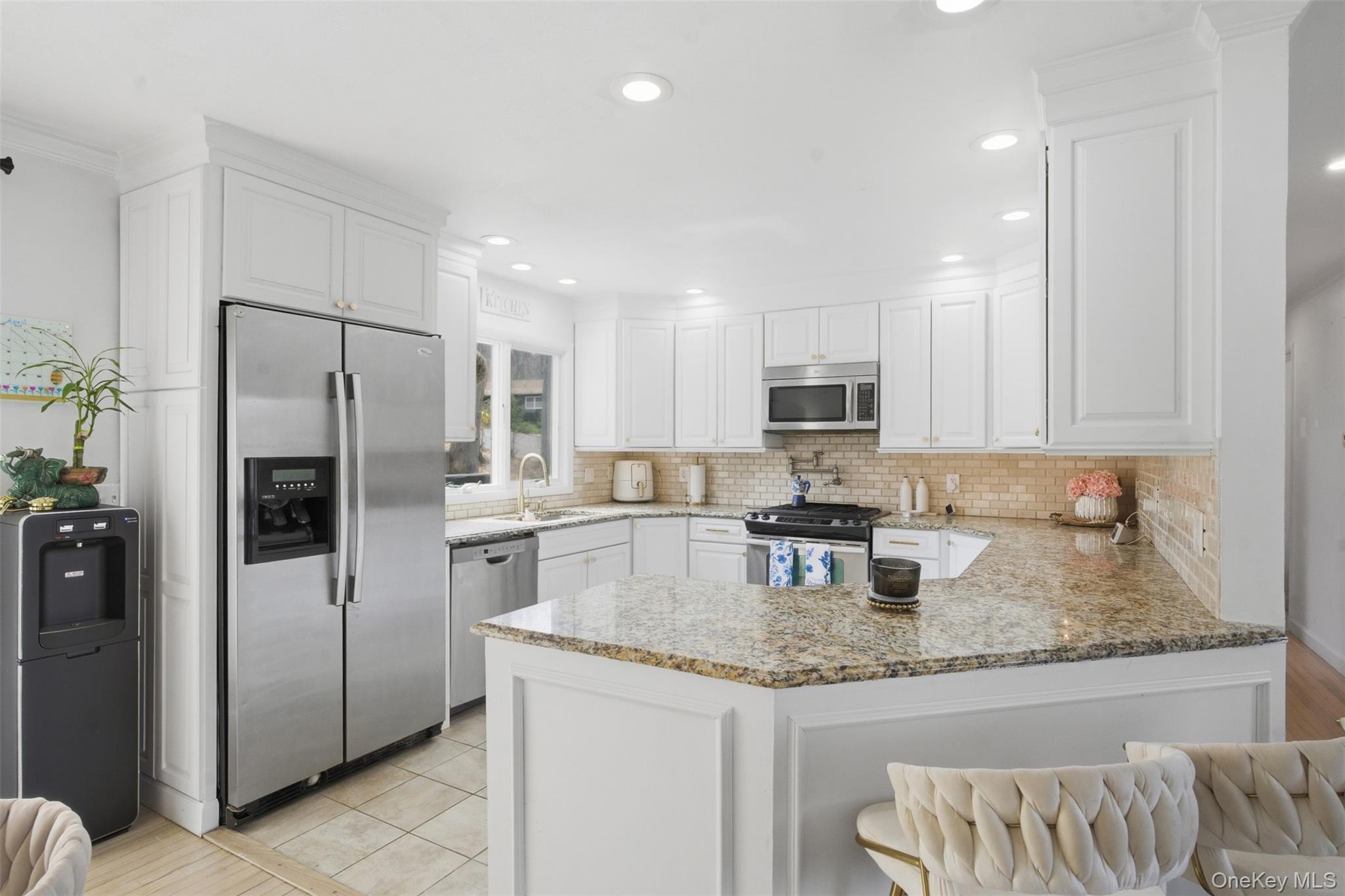 2 Olympus Road Highland Mills, NY 10930 - Photo 9 of 31 a kitchen with stainless steel appliances granite countertop a refrigerator sink and stove