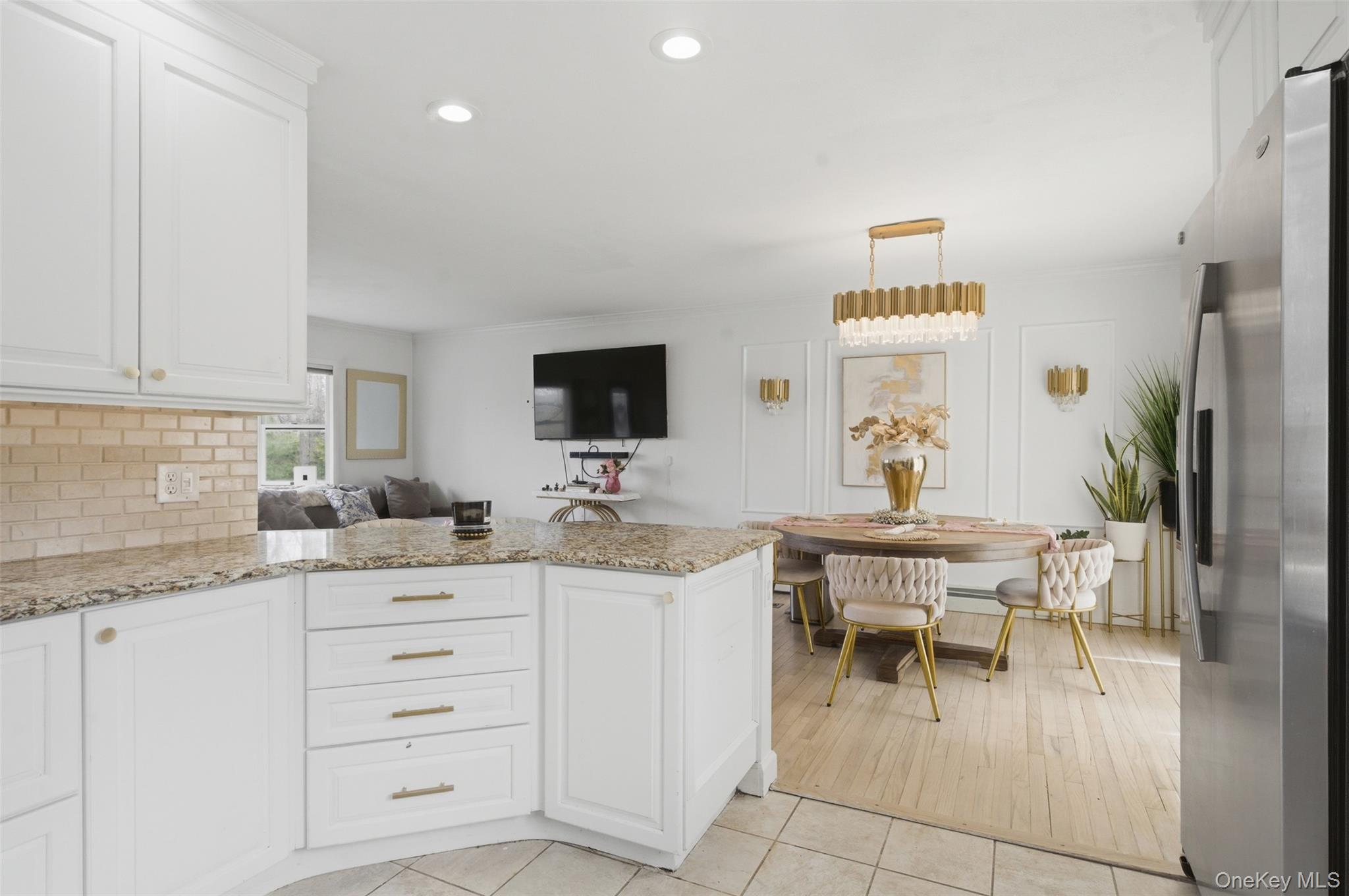 2 Olympus Road Highland Mills, NY 10930 - Photo 10 of 31 a kitchen with a sink and chairs