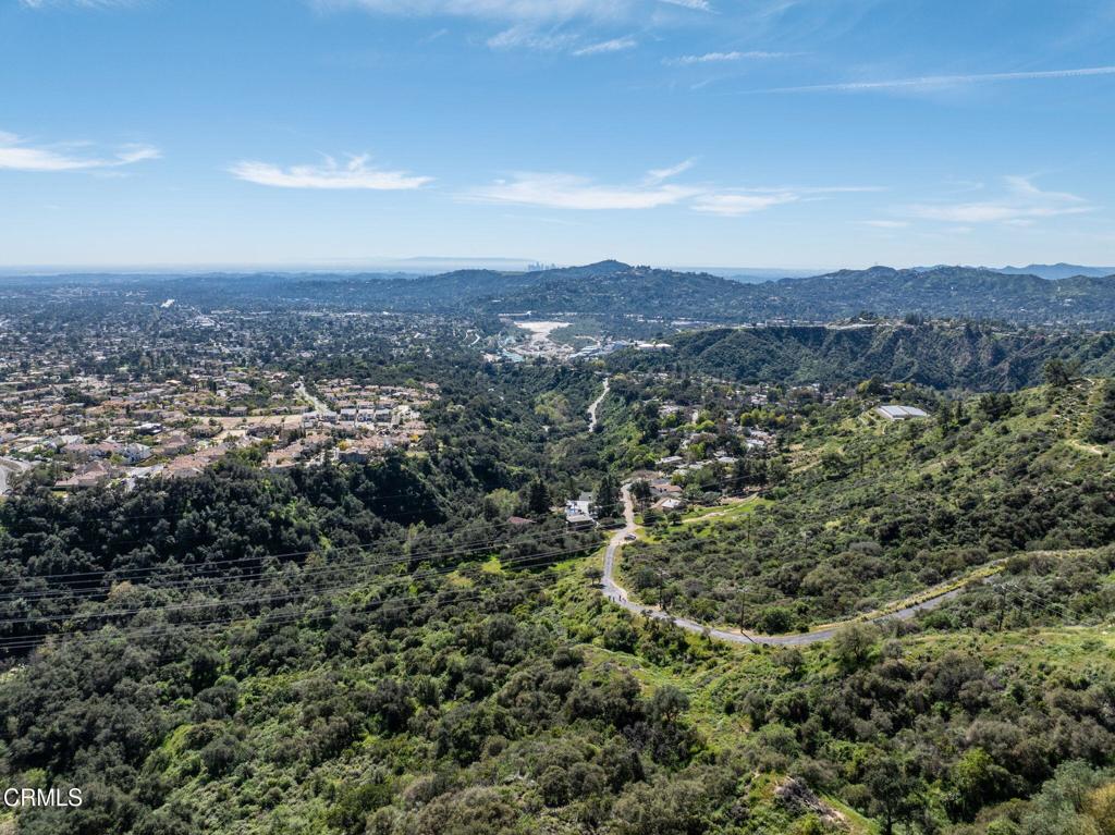 4700 Rising Hill Road Altadena, CA 91001 - Photo 16 of 35 a view of a city with mountains in the background