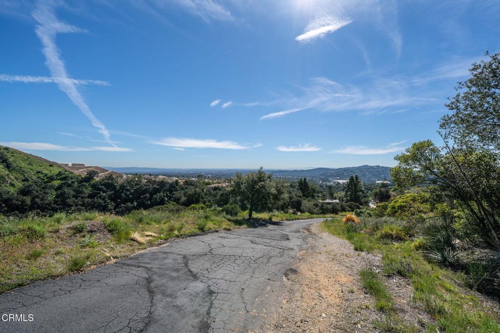 4700 Rising Hill Road Altadena, CA 91001 - Photo 3 of 35 a view of a pathway with a lake