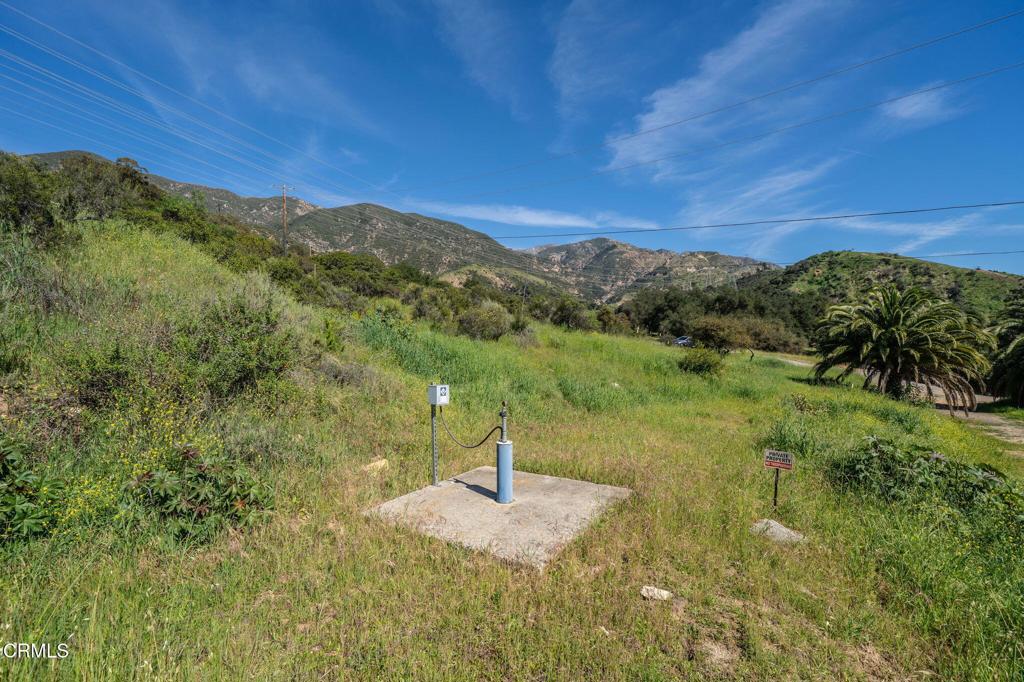 4700 Rising Hill Road Altadena, CA 91001 - Photo 9 of 35 a view of a lake with a mountain in the background