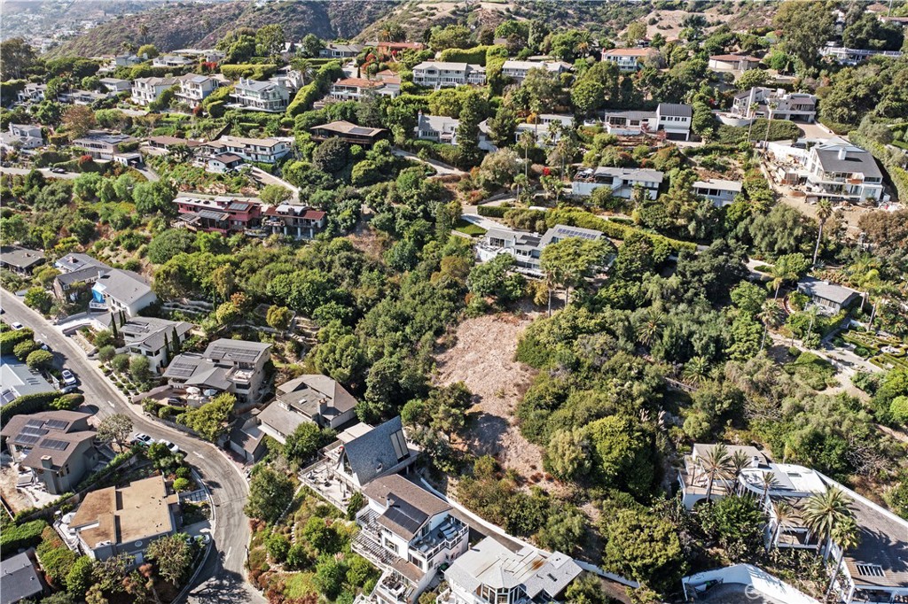 1863 Rim Rock Canyon Road Laguna Beach, CA 92651 - Photo 11 of 32 an aerial view of a city with lots of residential buildings