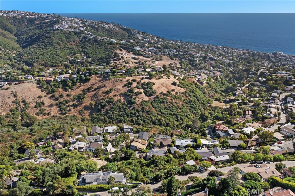 1863 Rim Rock Canyon Road Laguna Beach, CA 92651 - Photo 12 of 32 an aerial view of a house with a yard
