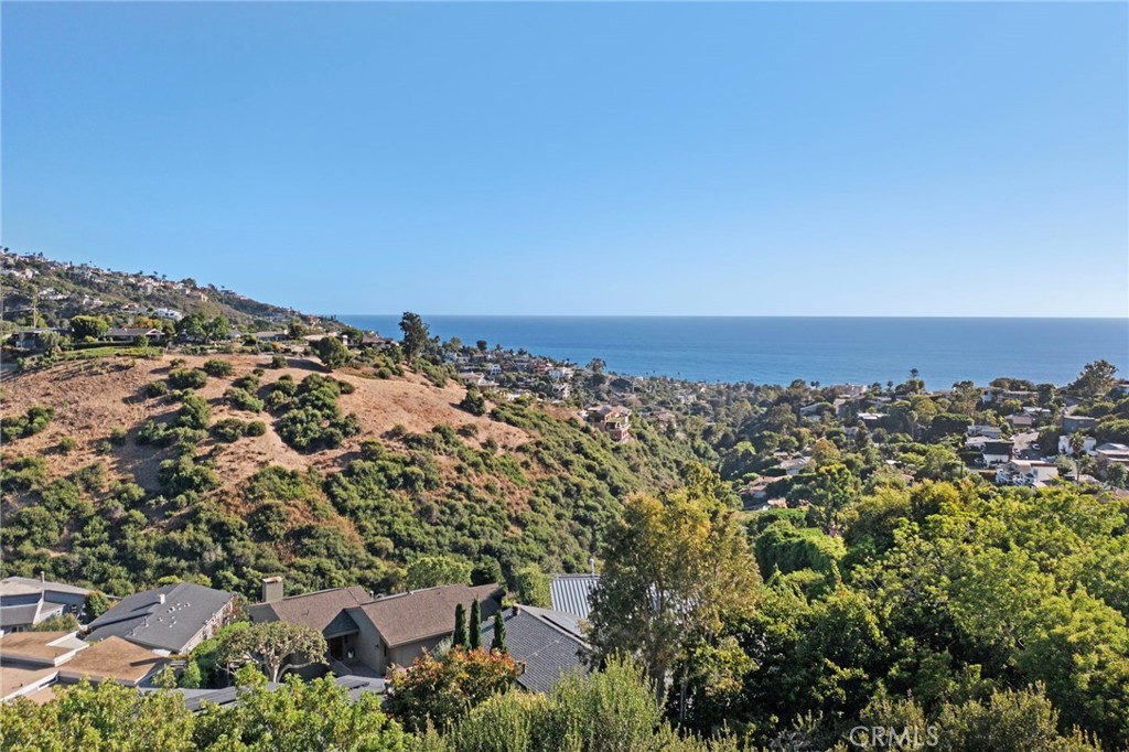 1863 Rim Rock Canyon Road Laguna Beach, CA 92651 - Photo 19 of 32 an aerial view of a house with a yard