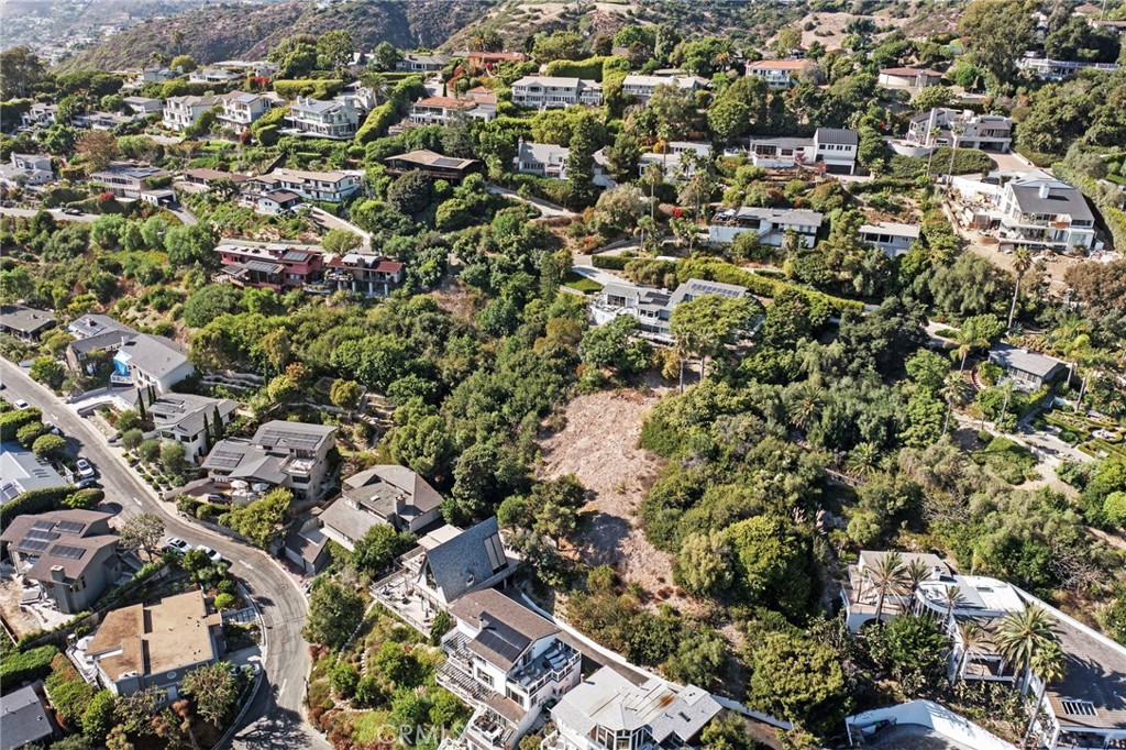1863 Rim Rock Canyon Road Laguna Beach, CA 92651 - Photo 23 of 32 an aerial view of residential houses with city view