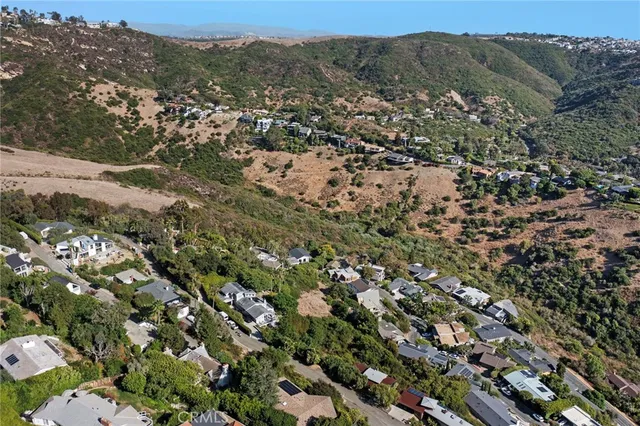 an aerial view of a city with lots of residential buildings