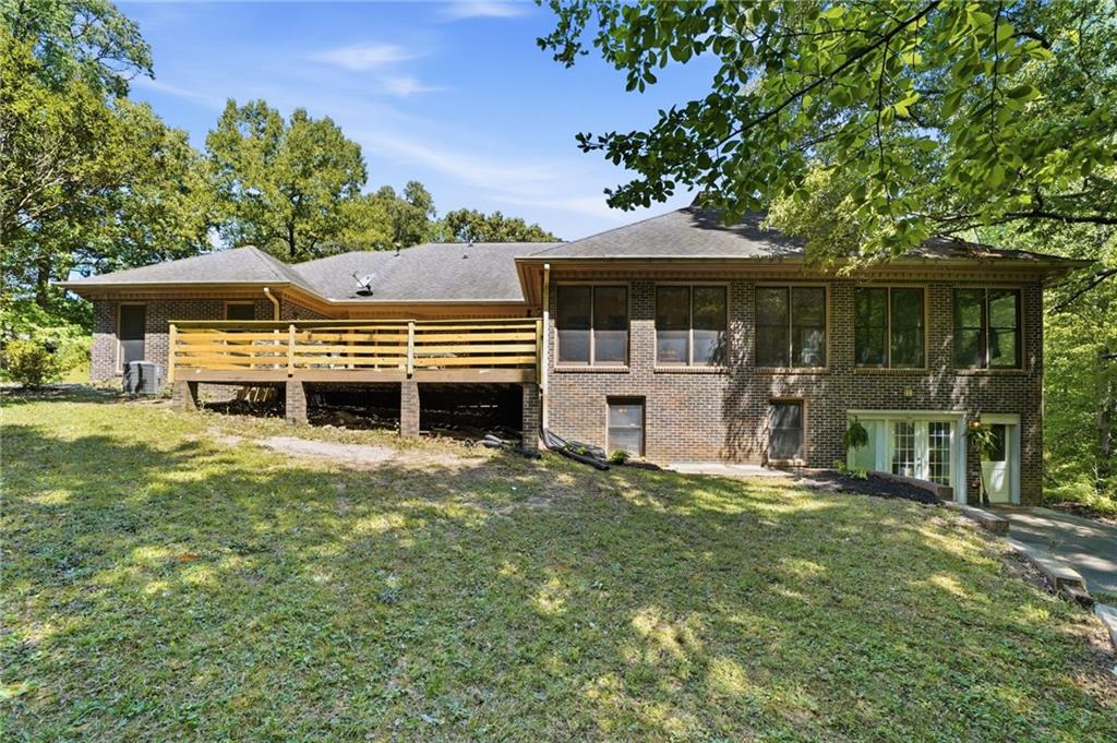 2737 John Petree Road Powder Springs, GA 30127 - Photo 49 of 55 a front view of a house with a yard