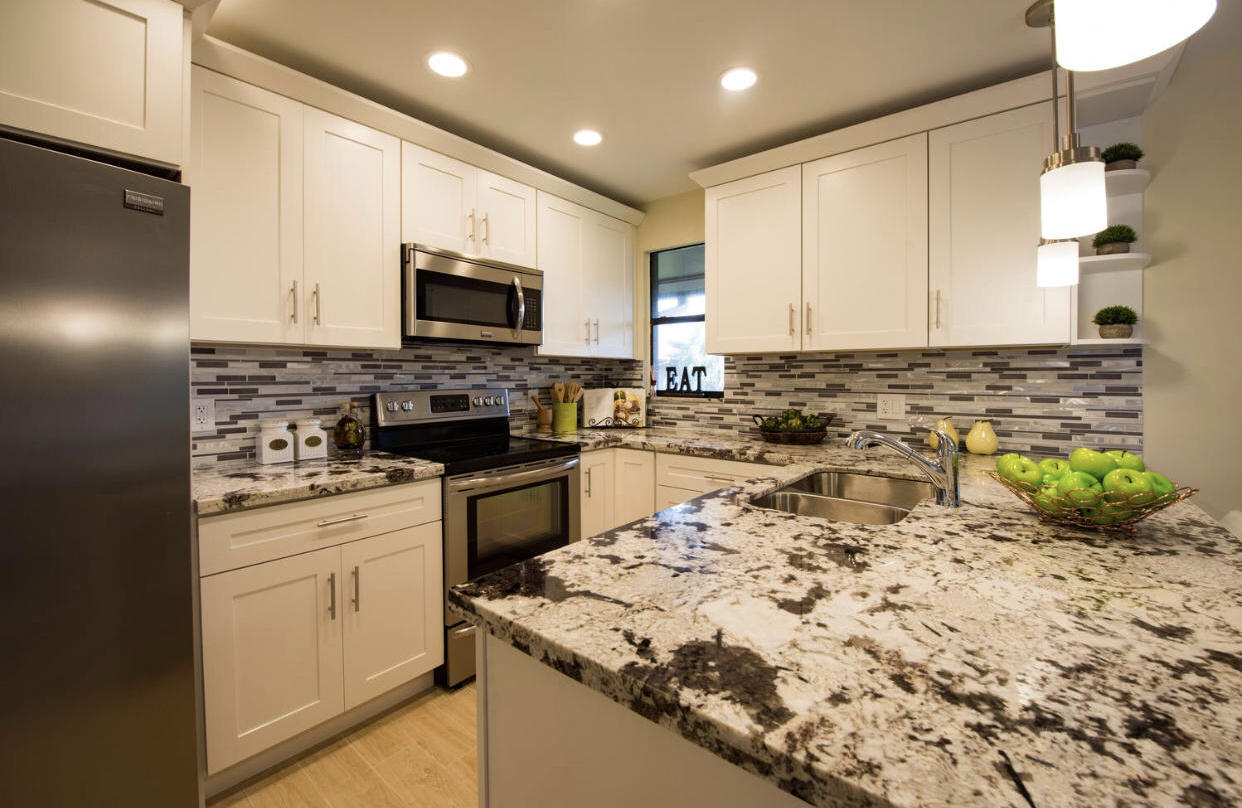 7084 Rain Forest Drive Boca Raton, FL 33434 - Photo 1 of 16 Upgraded Kitchen