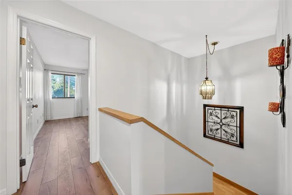 a view of wooden floor in an empty room