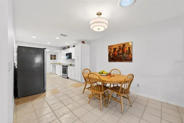 a view of a dining room with furniture