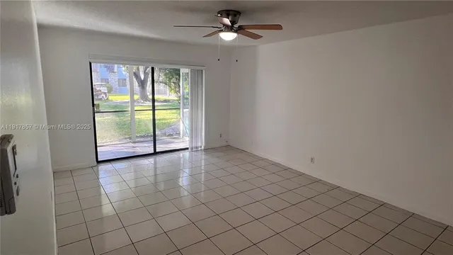 a kitchen with a sink cabinets and appliances
