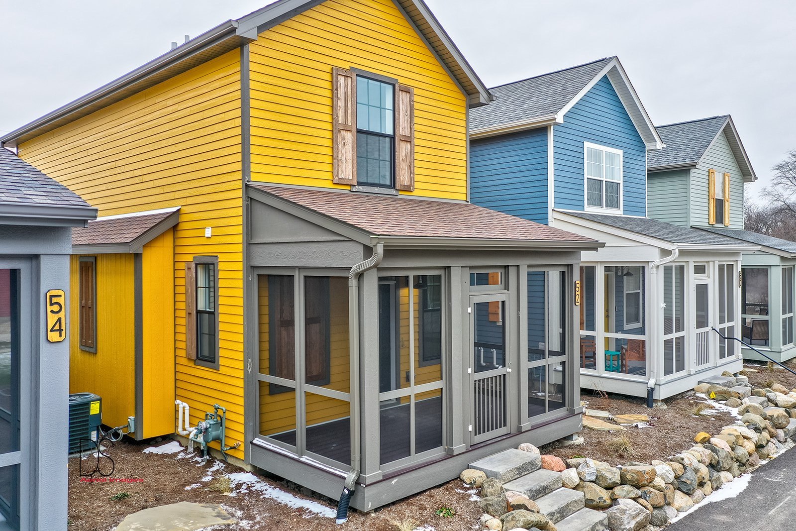 100 Great Loop E Drive, Unit 52 Ottawa, IL 61350 - Photo 1 of 13 a view of a house with a large window and wooden fence