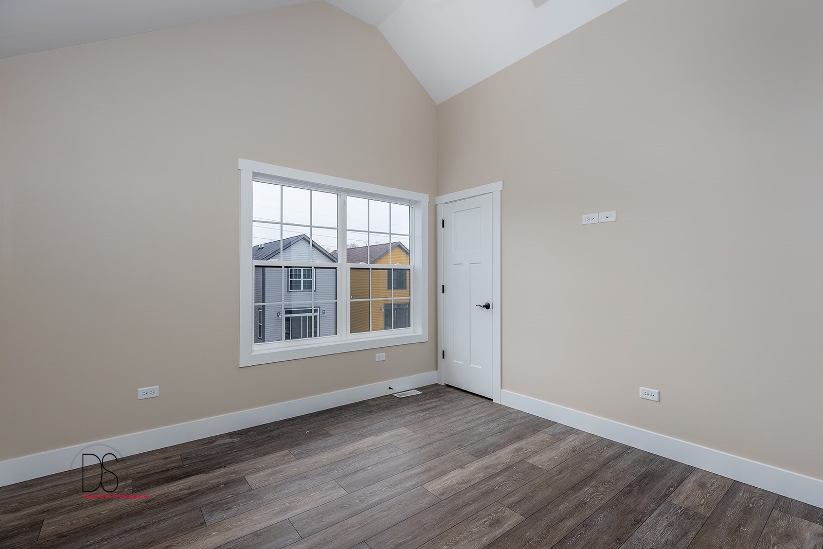 100 Great Loop E Drive, Unit 52 Ottawa, IL 61350 - Photo 7 of 13 an empty room with wooden floor and windows