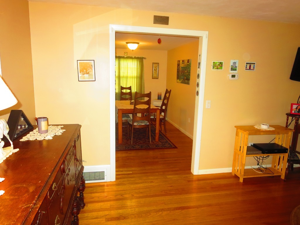 45 Hadley Street Springfield, MA 01118 - Photo 3 of 21 a view of a living room and dining room