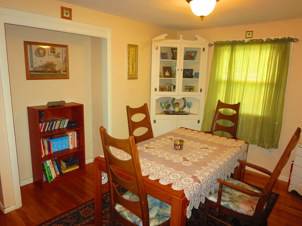 45 Hadley Street Springfield, MA 01118 - Photo 4 of 21 a view of a dining room with furniture and a window