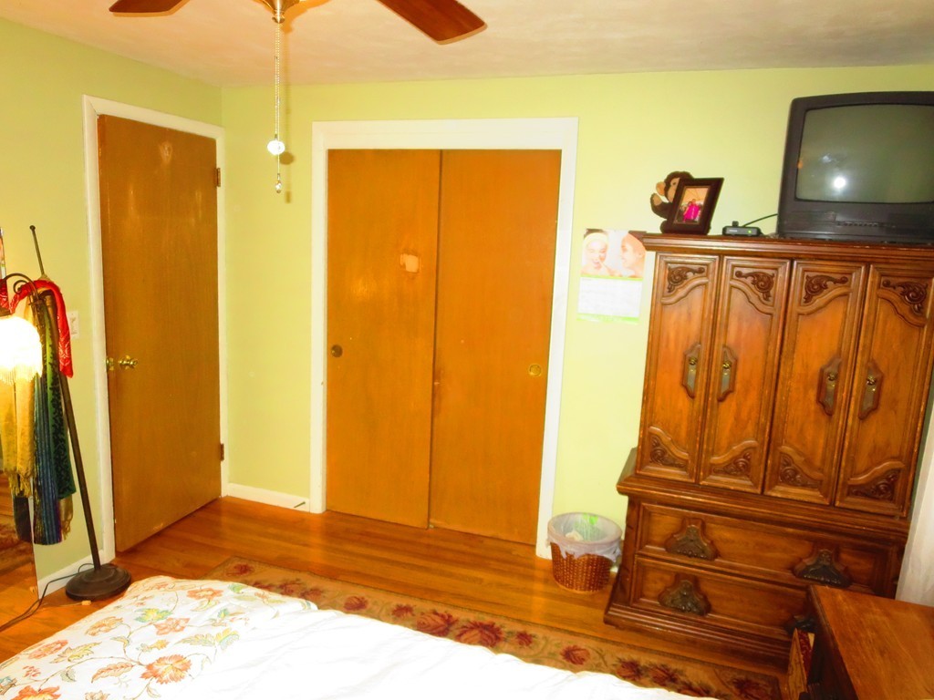 45 Hadley Street Springfield, MA 01118 - Photo 7 of 21 a view of a room with wooden door